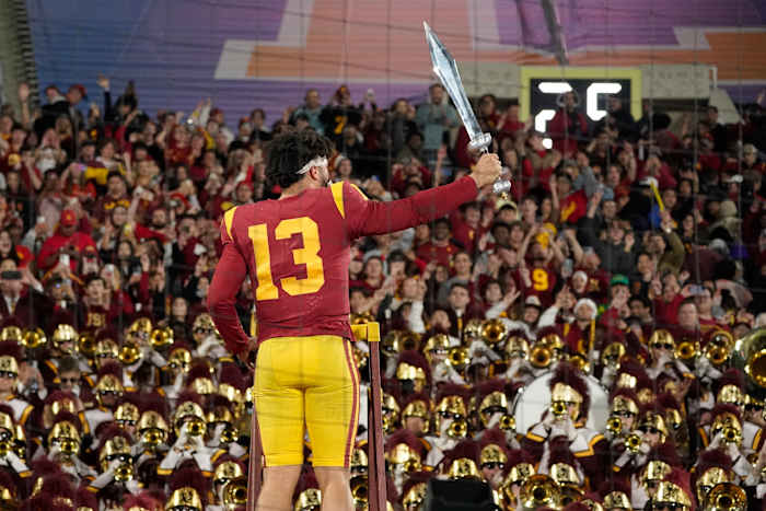Southern California quarterback Caleb Williams leads the USC Marching Band after USC defeat UCLA 48-45 in an NCAA college football game Saturday, Nov. 19, 2022, in Pasadena, Calif.